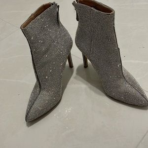 Rhinestone booties with stiletto heel. Zip in the back. Aqua by Bloomingdales
